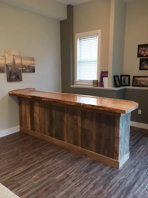 Pictured: a custom live-edge bar built for a client